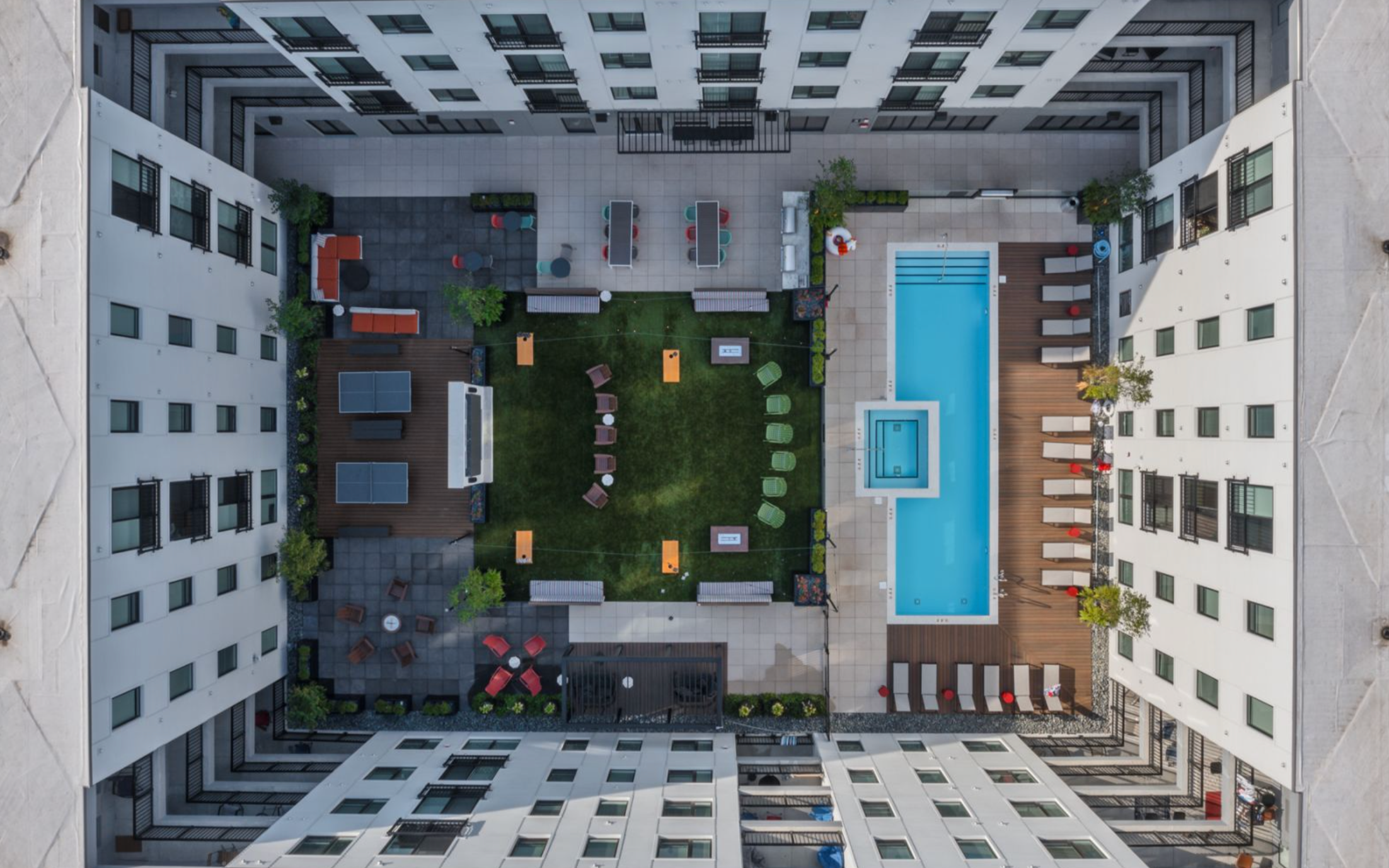 Center Courtyard with Resort-Style Pool and Hot Tub,
Outdoor Grilling Area,
Outdoor Lawn Games,
Larg 