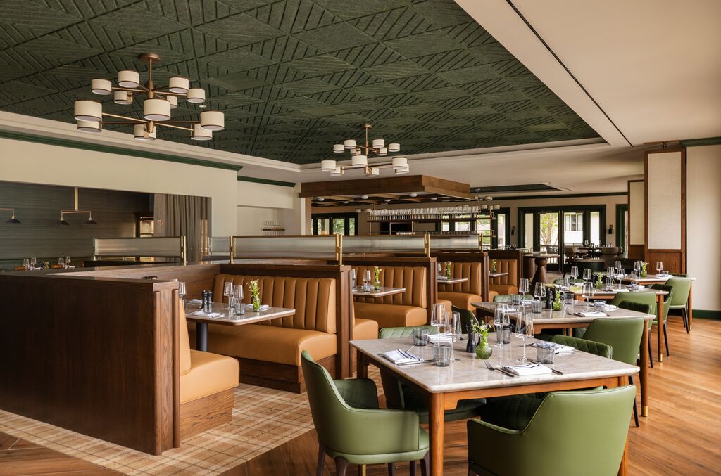 From the first pour to the last bite, the atmosphere does as much work as the kitchen.