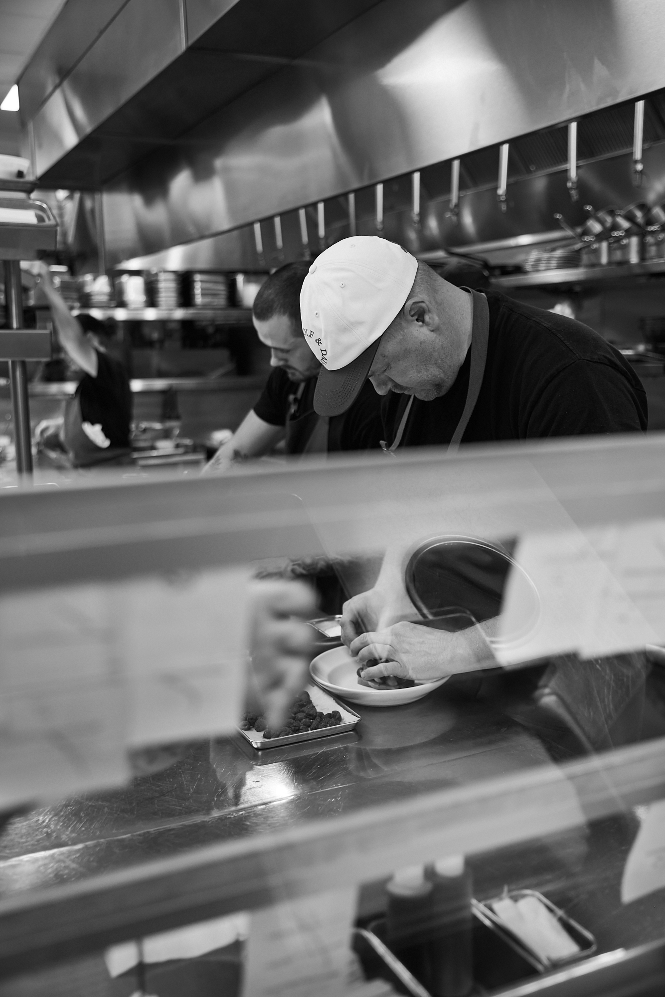 Behind the scenes kitchen preparation at Rolf and Daughters. The restaurant sits inside the historic 