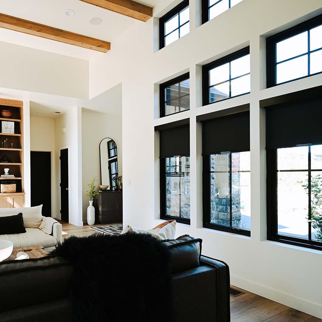 Black Roller Shades add a modern touch to this beautiful home. Budget Blinds of Chilliwack, Hope and Harrison Chilliwack (604)824-0375