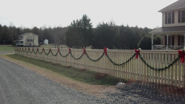 4' high 1x4 picket fence with two cap boards and 2 1/2" spacing between vertical pickets