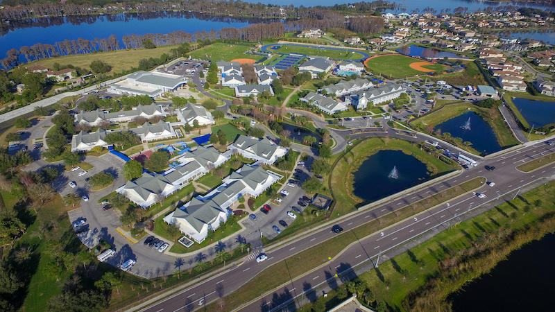 The campus, which features an abundance of green space and water elements, houses students and teachers comfortably in well-appointed classrooms within the three academic divisions of the school.

State-of-the-art athletic facilities provide venues that engage students in healthy physical activity year-round.