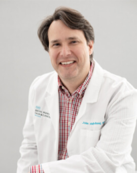 John K. Mulholland, MD