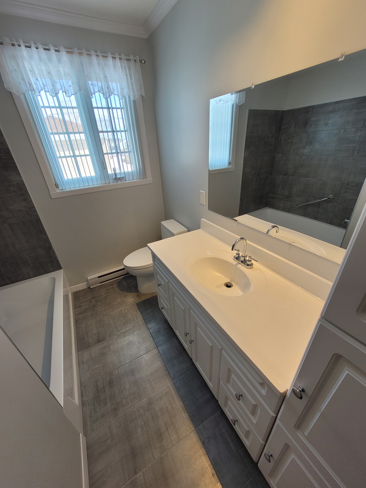 Images Iconic Construction - Rénovation Terrasse, Rénovation Salle de Bain L'Ancienne-Lorette