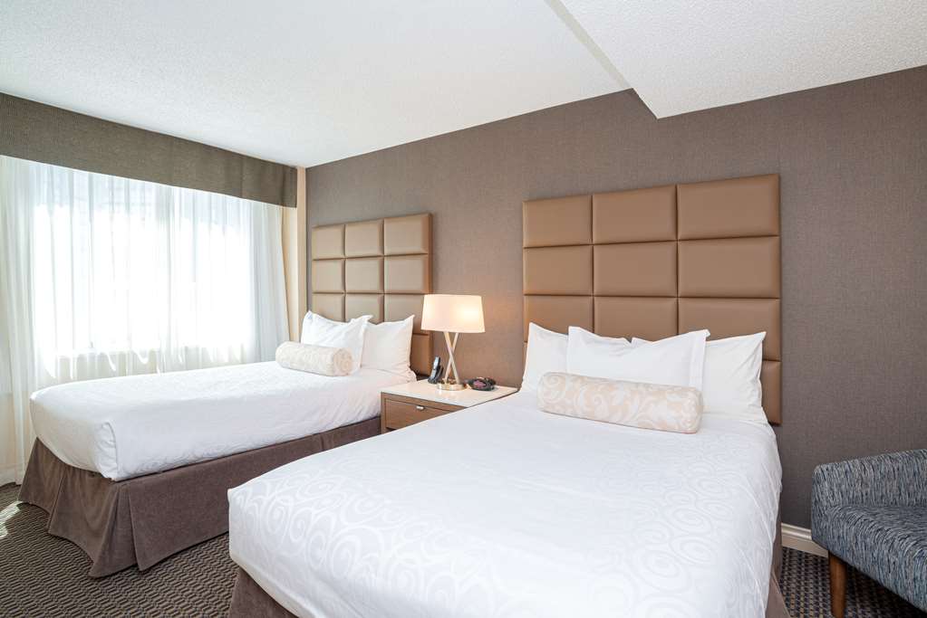 Best Western Premier Chateau Granville Hotel & Suites & Conf. Centre in Vancouver: Suite Two Double Beds- Perfect for guests traveling with a family or large group, this suite offers exceptional space with separate living room area and upgraded in-room features