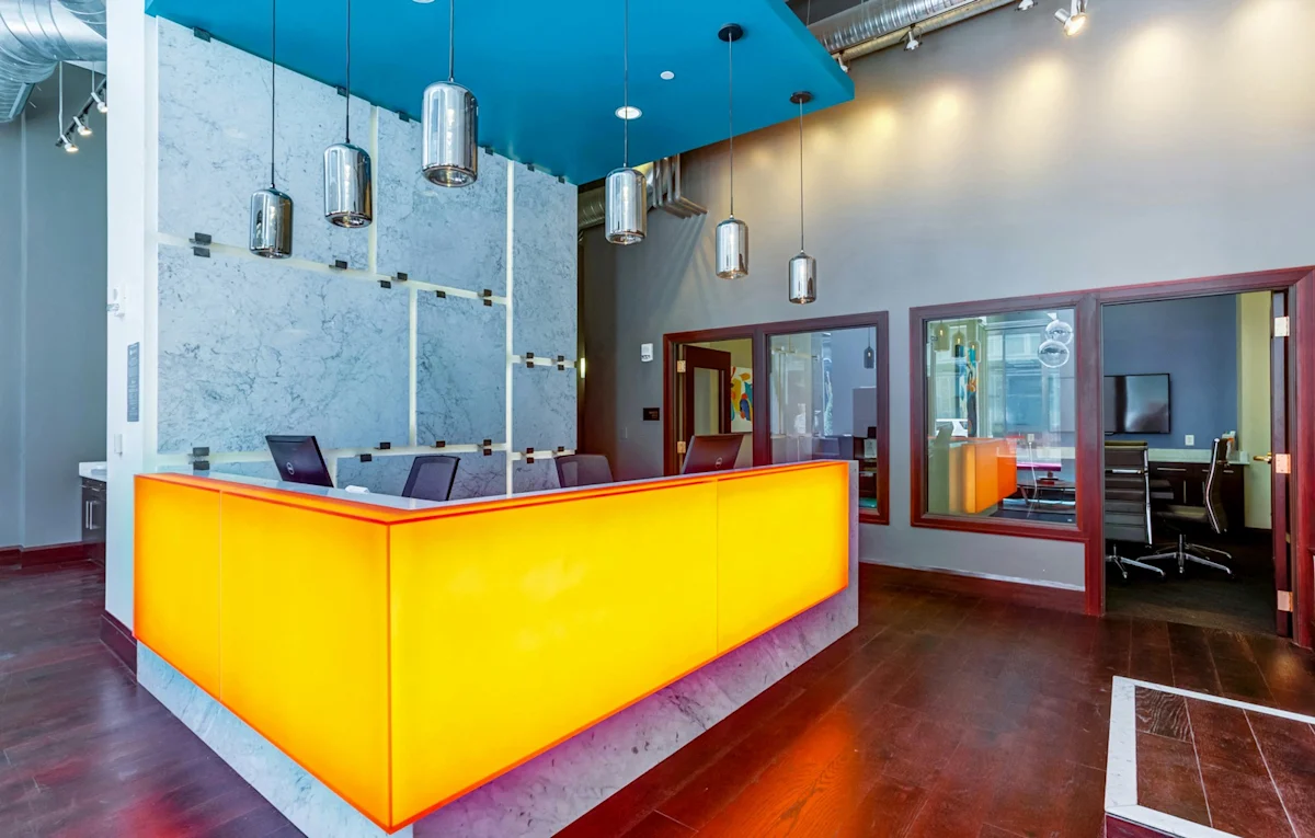 Lobby with yellow reception desk