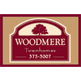 Woodmere Townhomes Logo