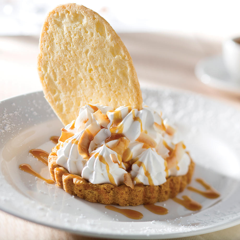 Coconut Cream Pie with house made caramel sauce and a hint of rum. The Capital Grille New York (212)374-1811