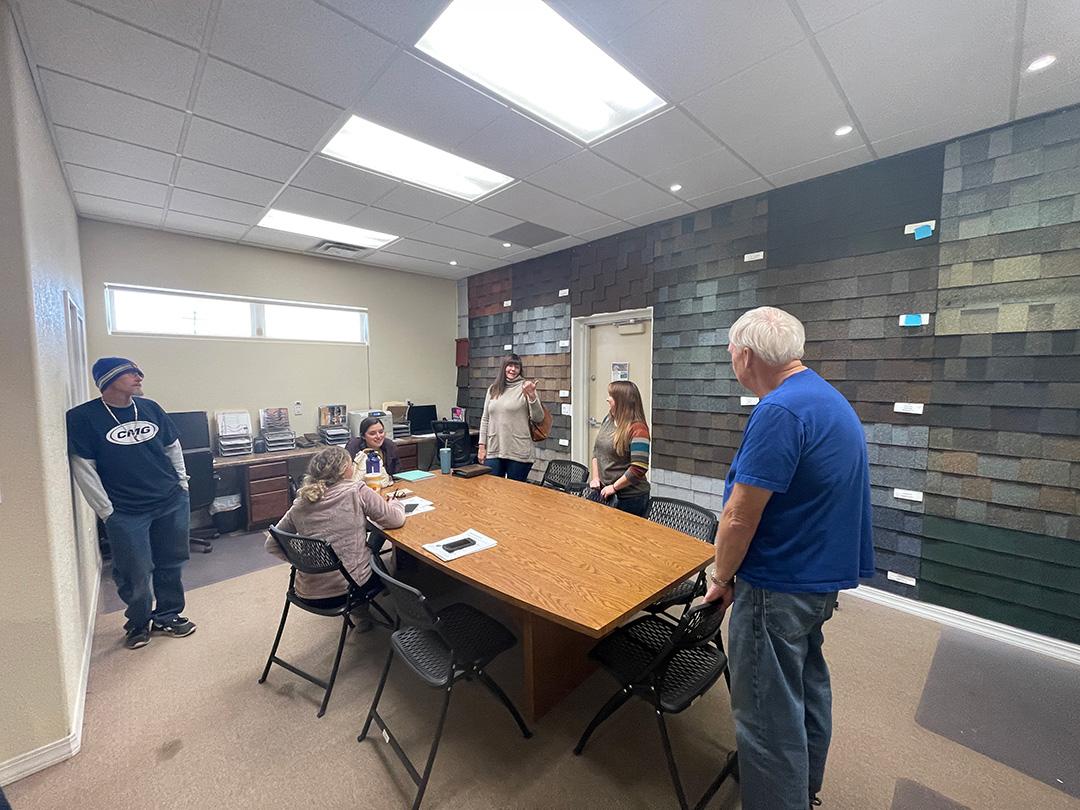 Old World Restoration and Carpet Cleaning staff around the conference table