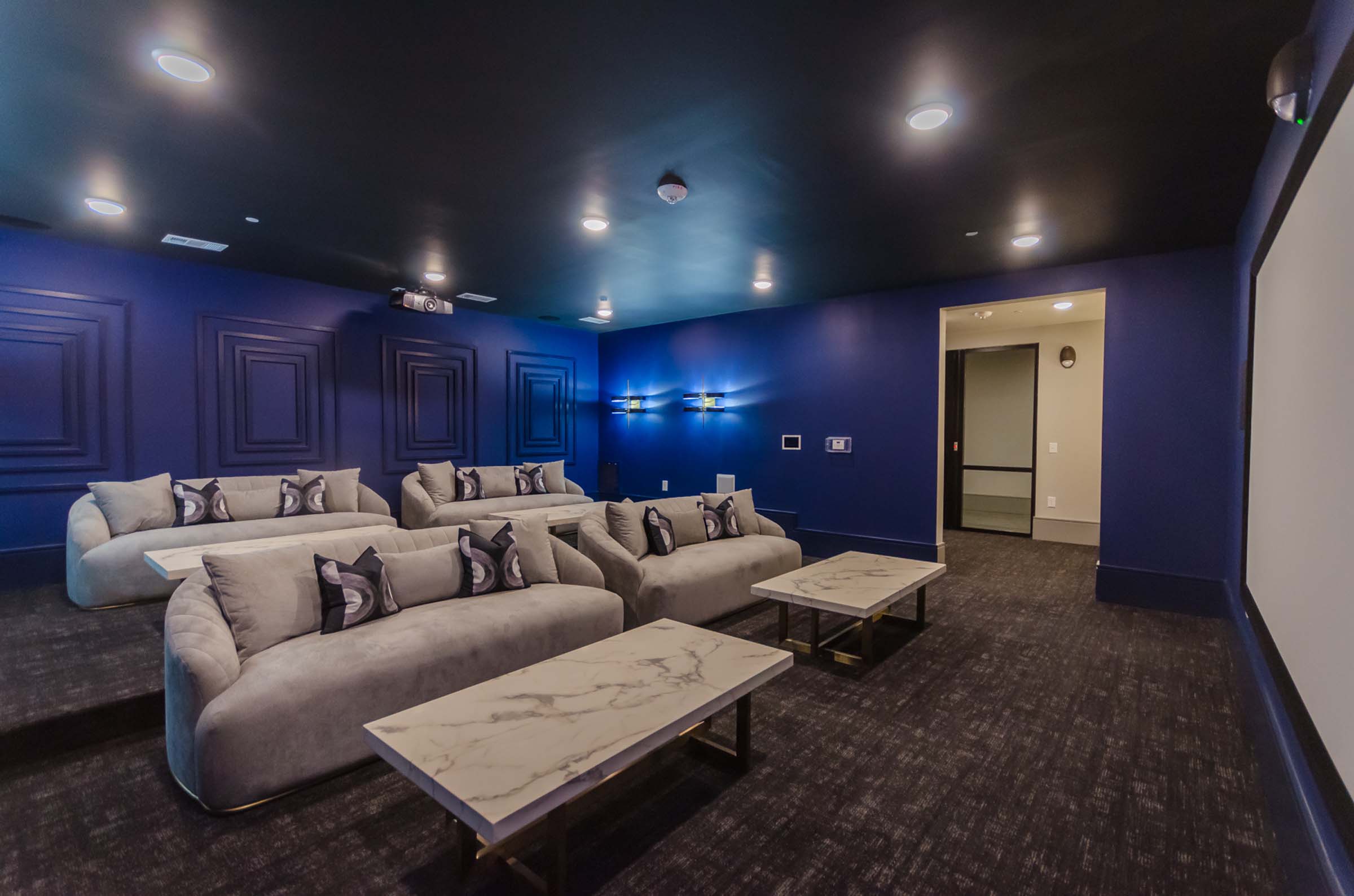 Media room with couch seating at Camden Alpharetta in Alpharetta, GA