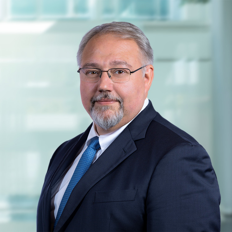 Headshot of Emilio Mariano, a wealth advisor at Chase