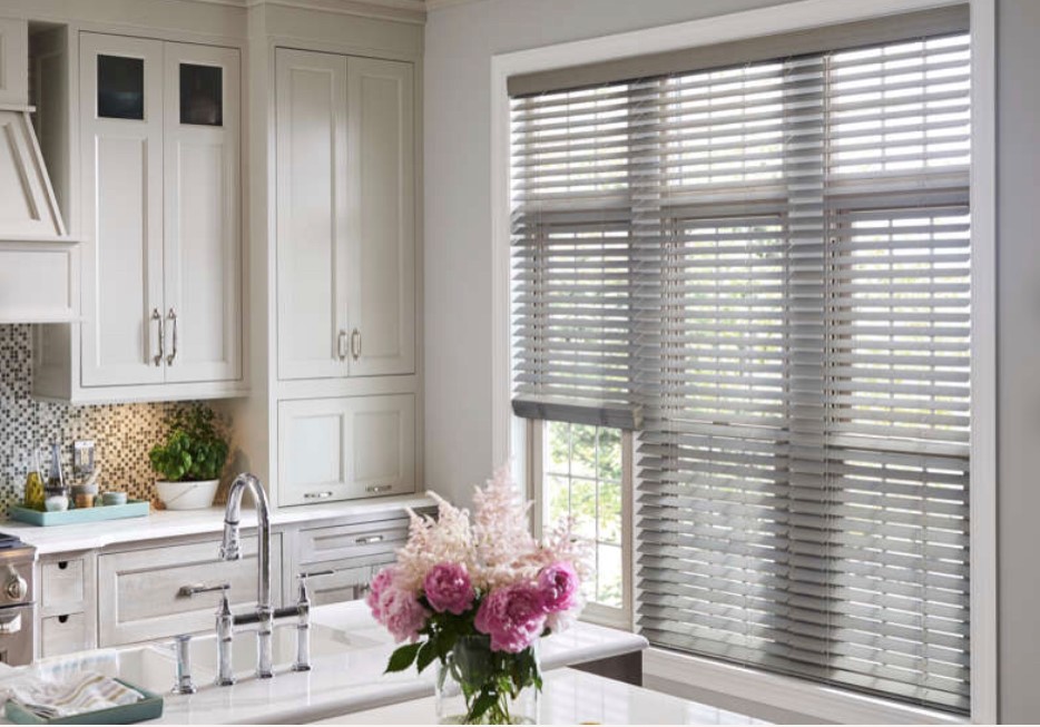 Faux Wood Blinds are some of the top blinds for budget friendly remodeling times. Budget Blinds of Rockwall, Forney, Terrell, and Greenville have a wide selection of colors and styles to help bring your ideal kitchen a reality.