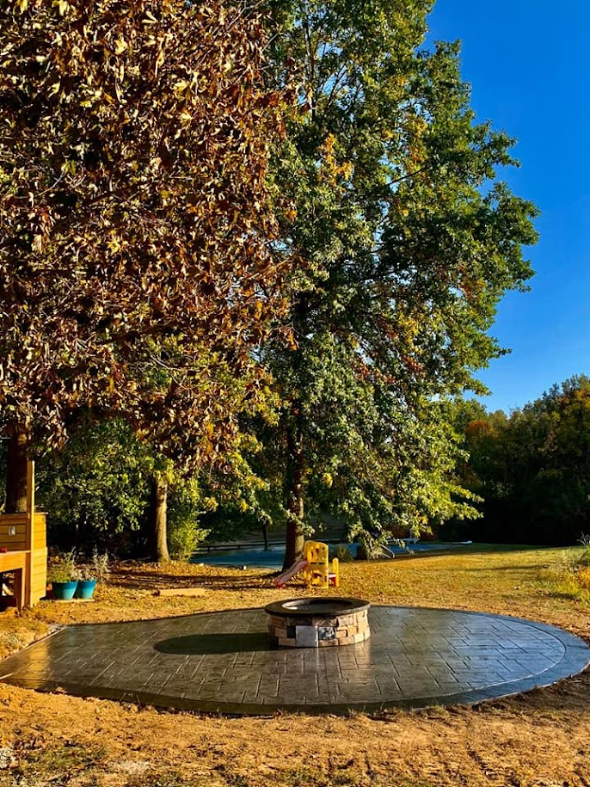 Spring is when homeowners start thinking about upgrades to their backyards. One of the most popular is installing a fire pit. We created one for this Mason, Ohio home last year. It sits on a stamped concrete patio. We think it really catches your eye. Reach out and let's talk about how you can upgraded your backyard this spring.