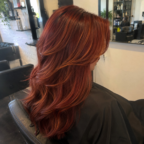 Custom red hair color at Avissa Salon in Ann Arbor is individually formulated to create rich, multid 