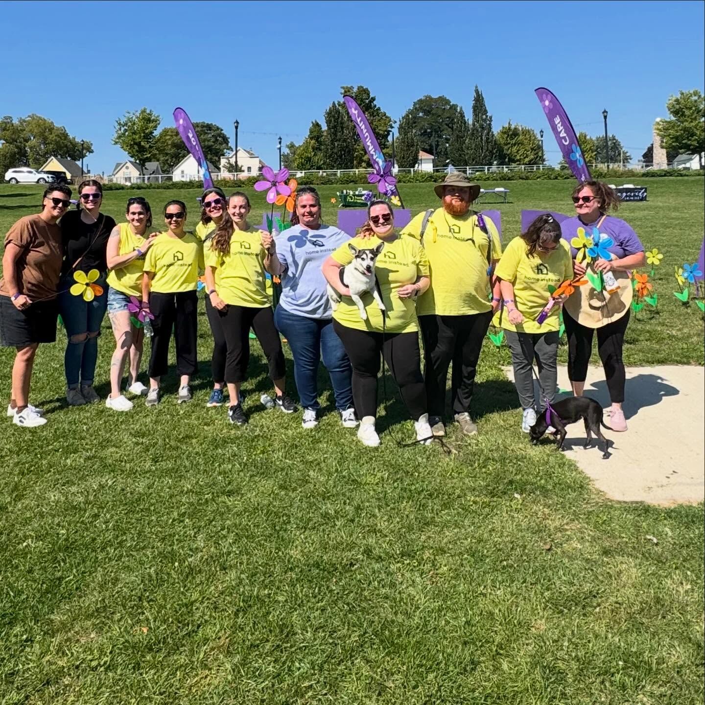 Home Instead team participating in a community event supporting older adults and raising awareness.