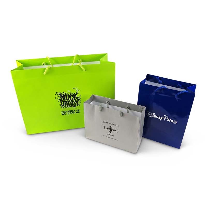 Retail paper bags for Muck Daddy and other brands. Custom packaging by PLC Print.