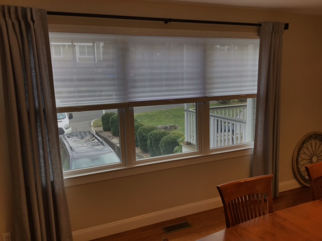 Get the perfect balance between privacy and enjoying a spectacular view in Pleasantville with our Honeycomb Shades and Decorative Drapery Side Panels.