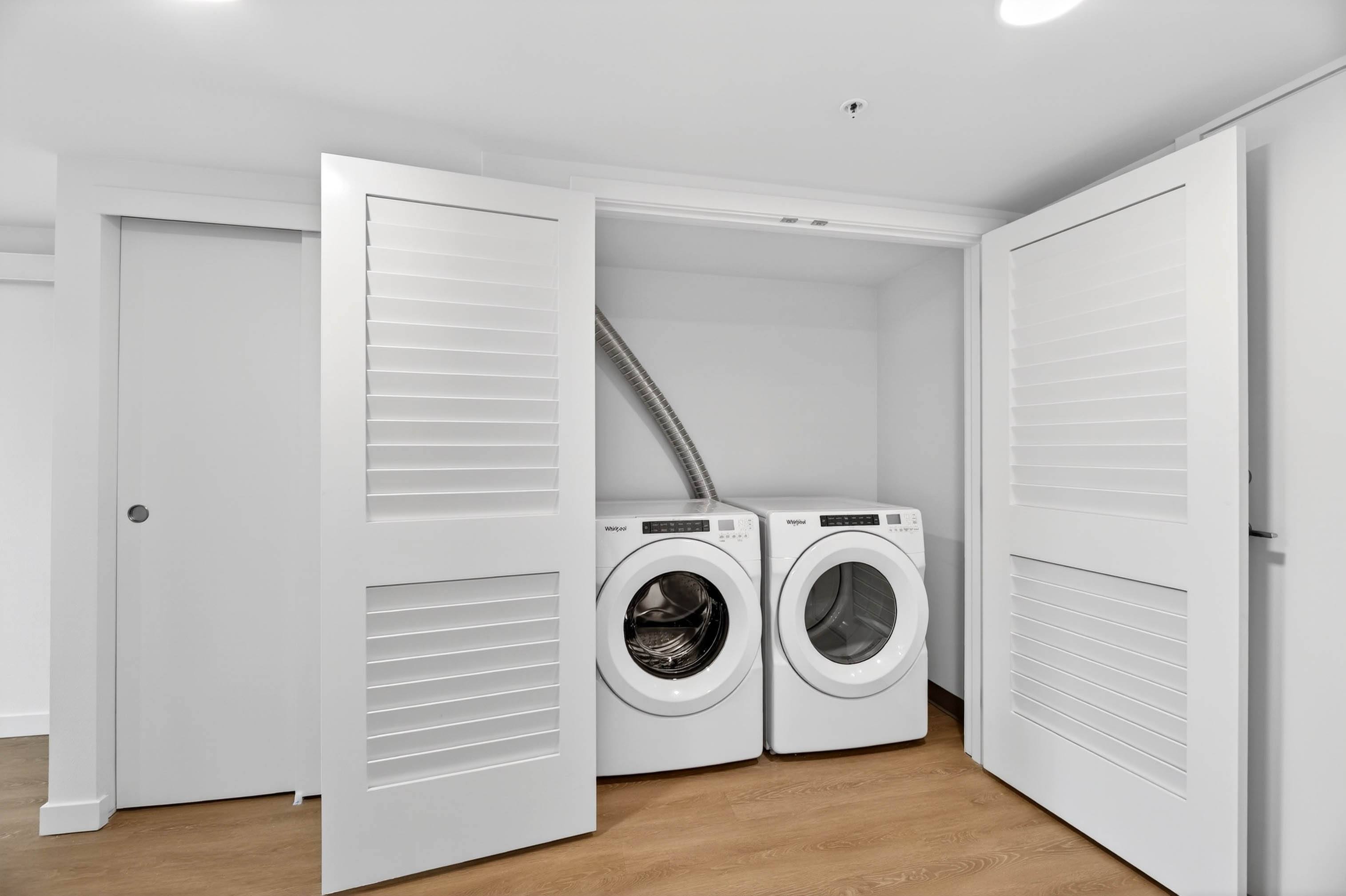 Closet view with washer and dryer