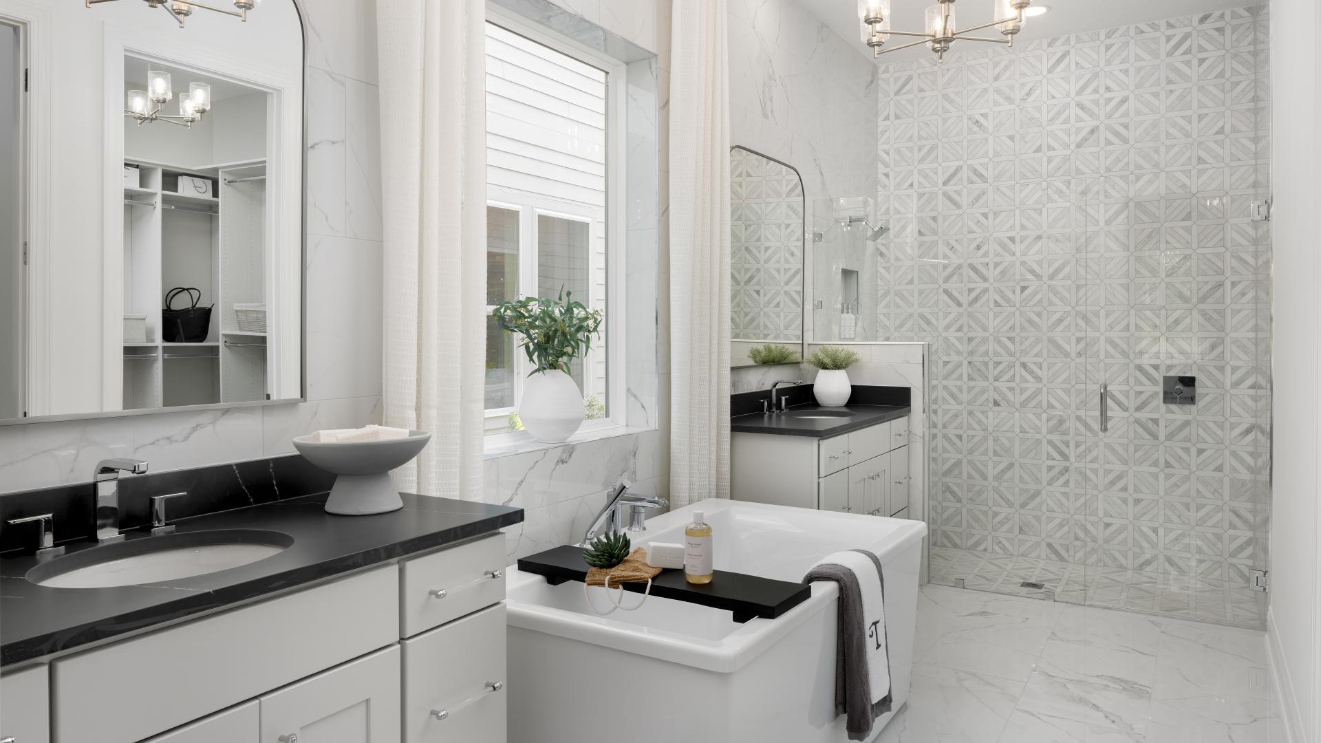 Luxurious primary baths with dual vanities and soaking tubs