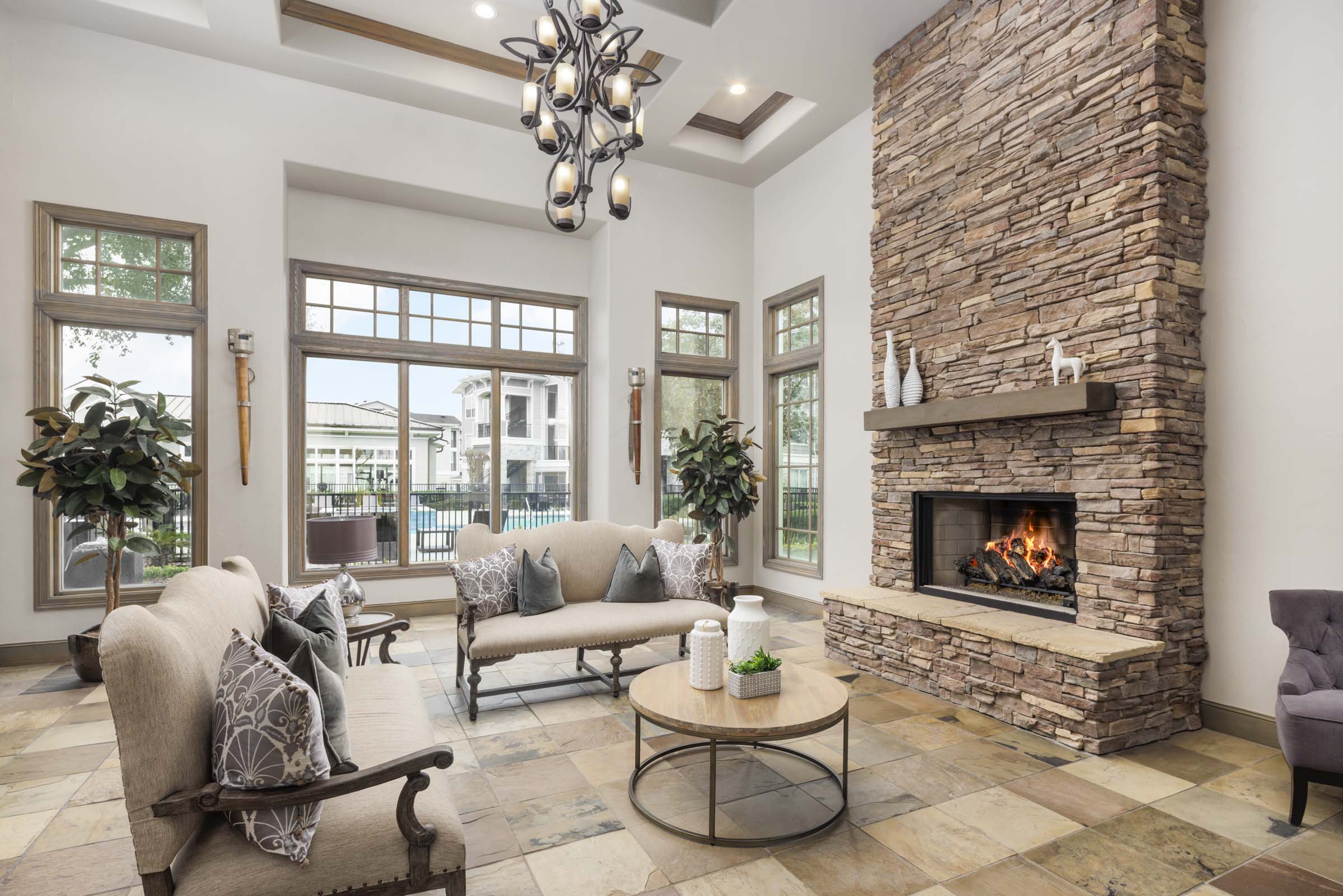 Resident lounge with kitchen and wifi at Camden Northpointe Apartments in Tomball, TX