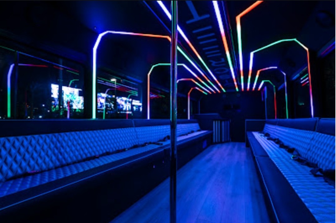 Las Vegas Party Bus 38 Passenger Let It Ride Interior with bar, dance pole and state of the art sound and lighting.