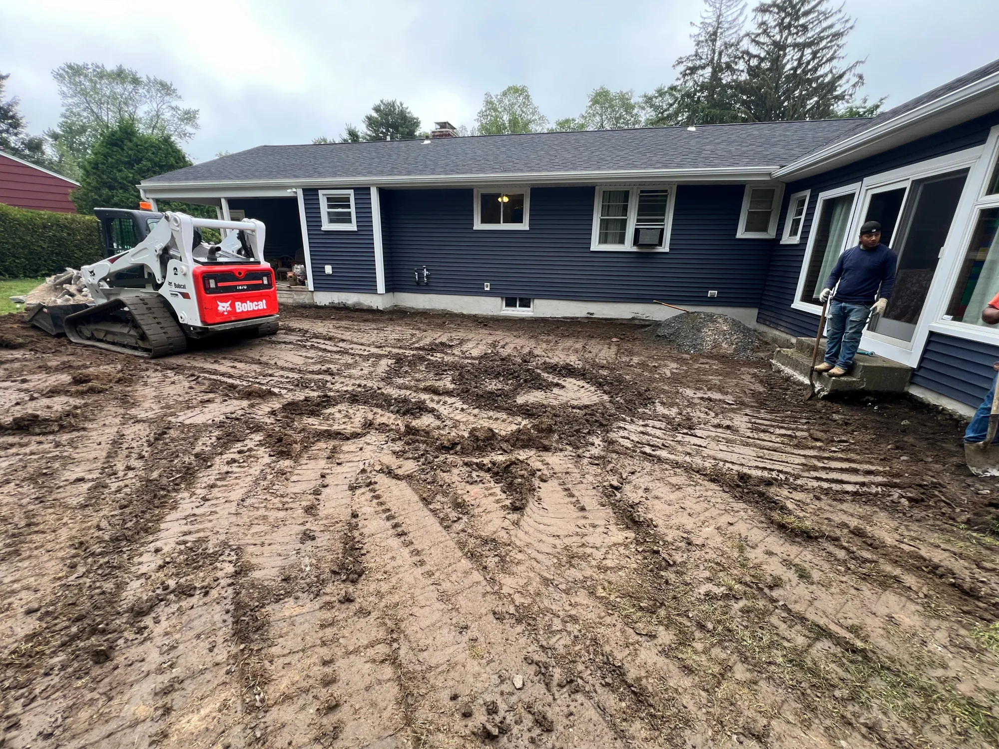 Site preparation for a multi-level paver patio in Trumbull CT - Multi-Layered Paver Patio, Trumbull project by General Masonry LLC.