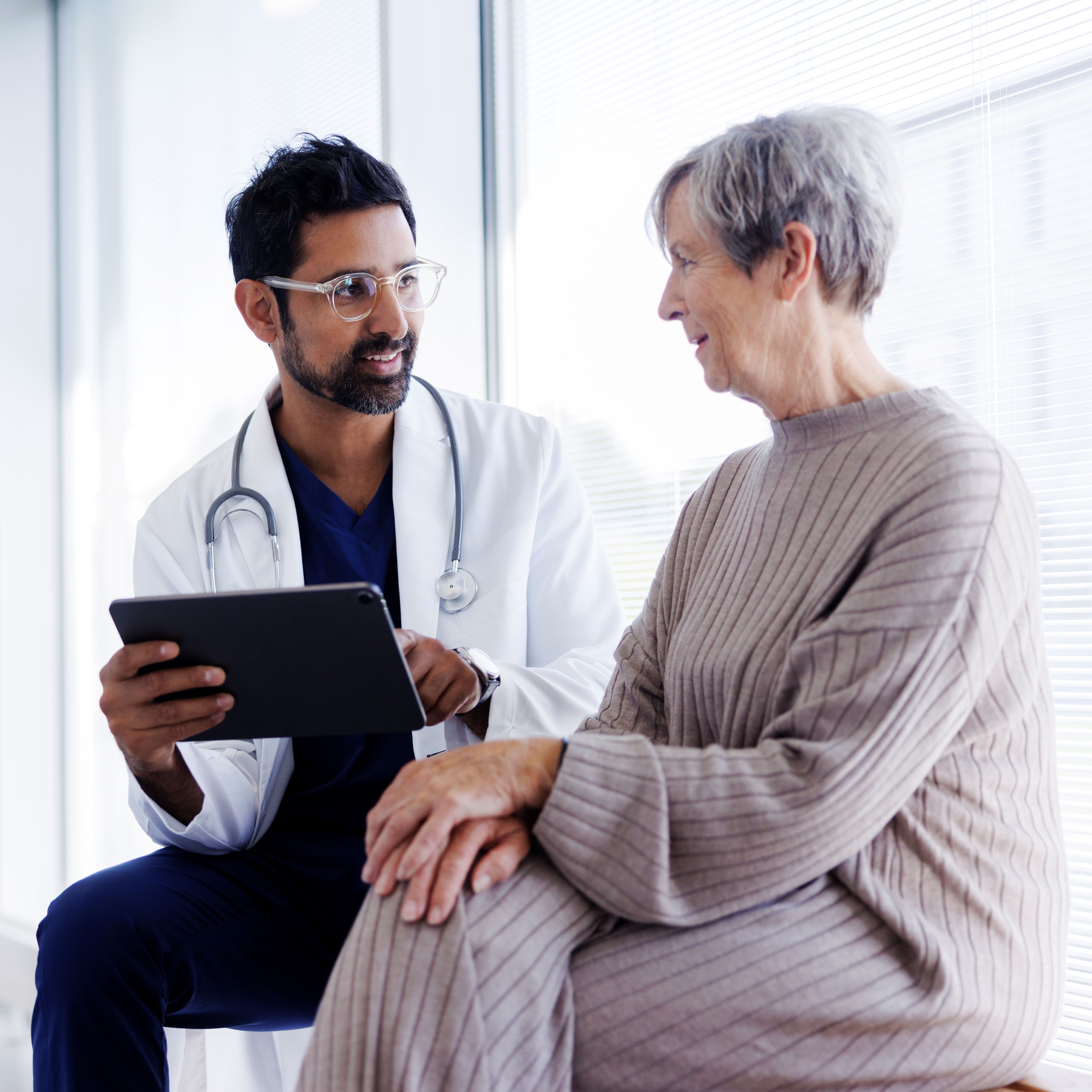 A doctor talking to a patient about Dialysis maintenance