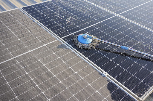 Close-up comparison of visibly dirty and recently cleaned solar panel surfaces, illustrating why routine photovoltaic panel cleaning can be an important part of solar system maintenance.