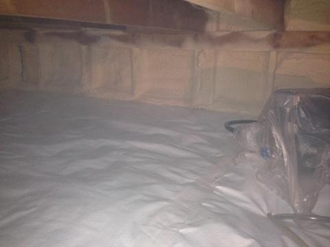 Crawlspace with vapor barrier.