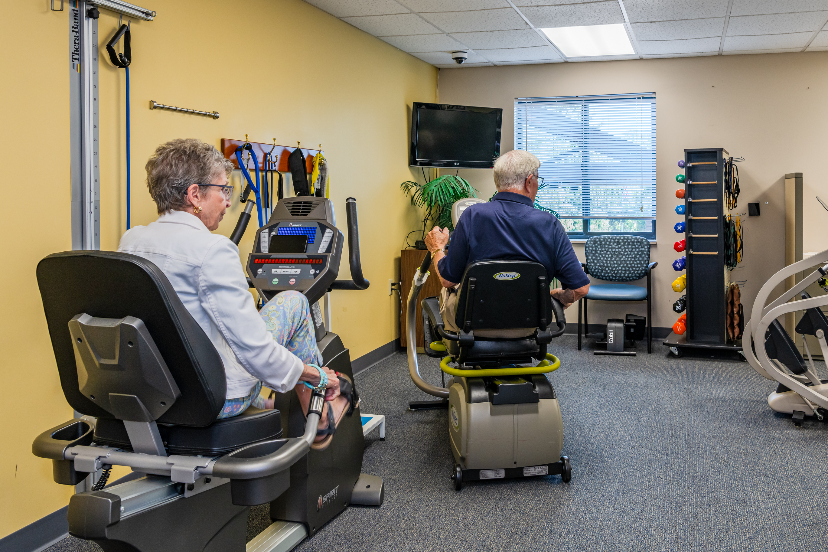 Residents stay active in the on-site fitness center at One Lincoln Park, supporting healthy and independent senior living in Dayton, OH.