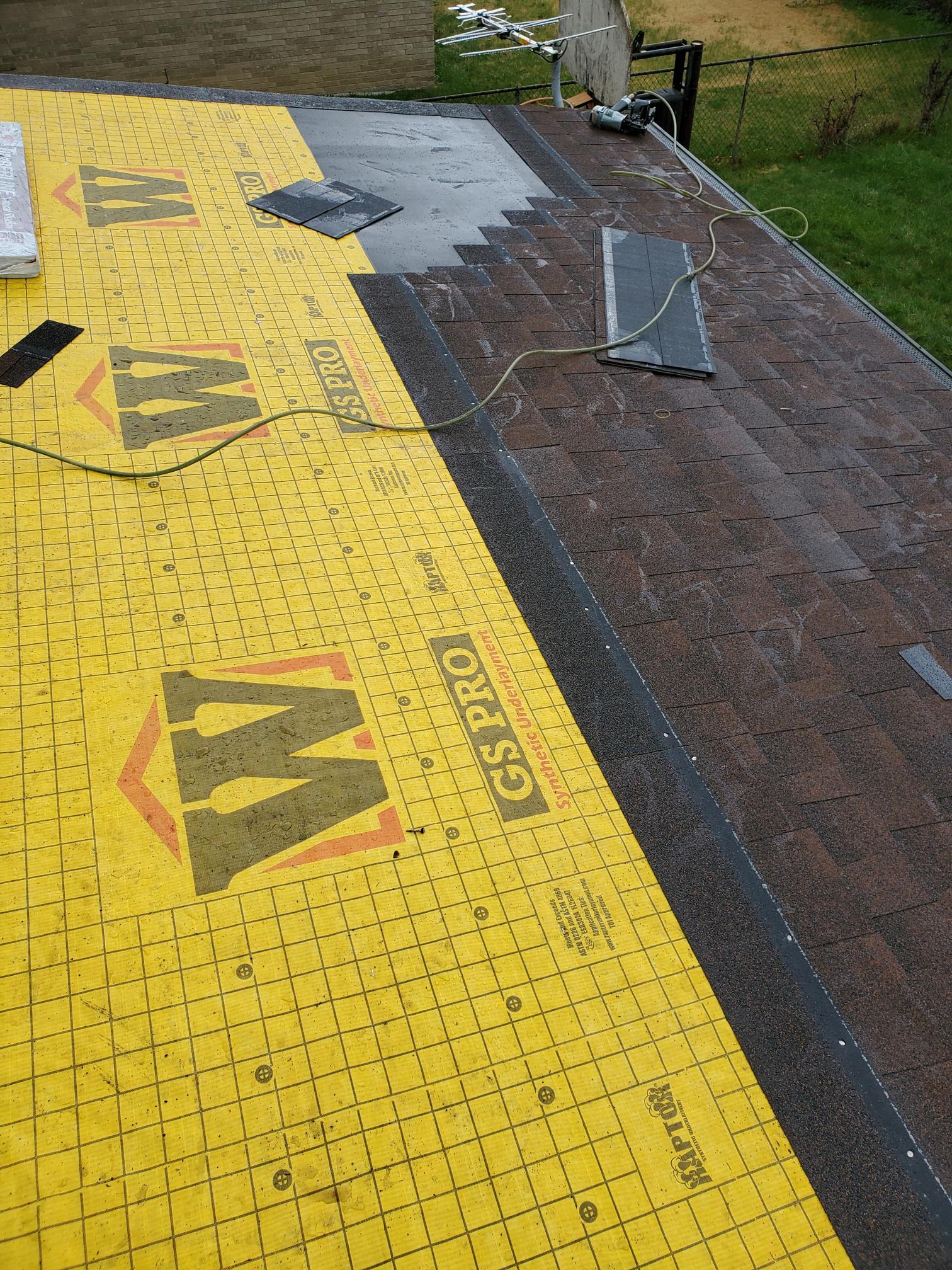 Synthetic Underlayment and shingles being installed on a roof Richards & Swift Roofing Troy (248)544-3908