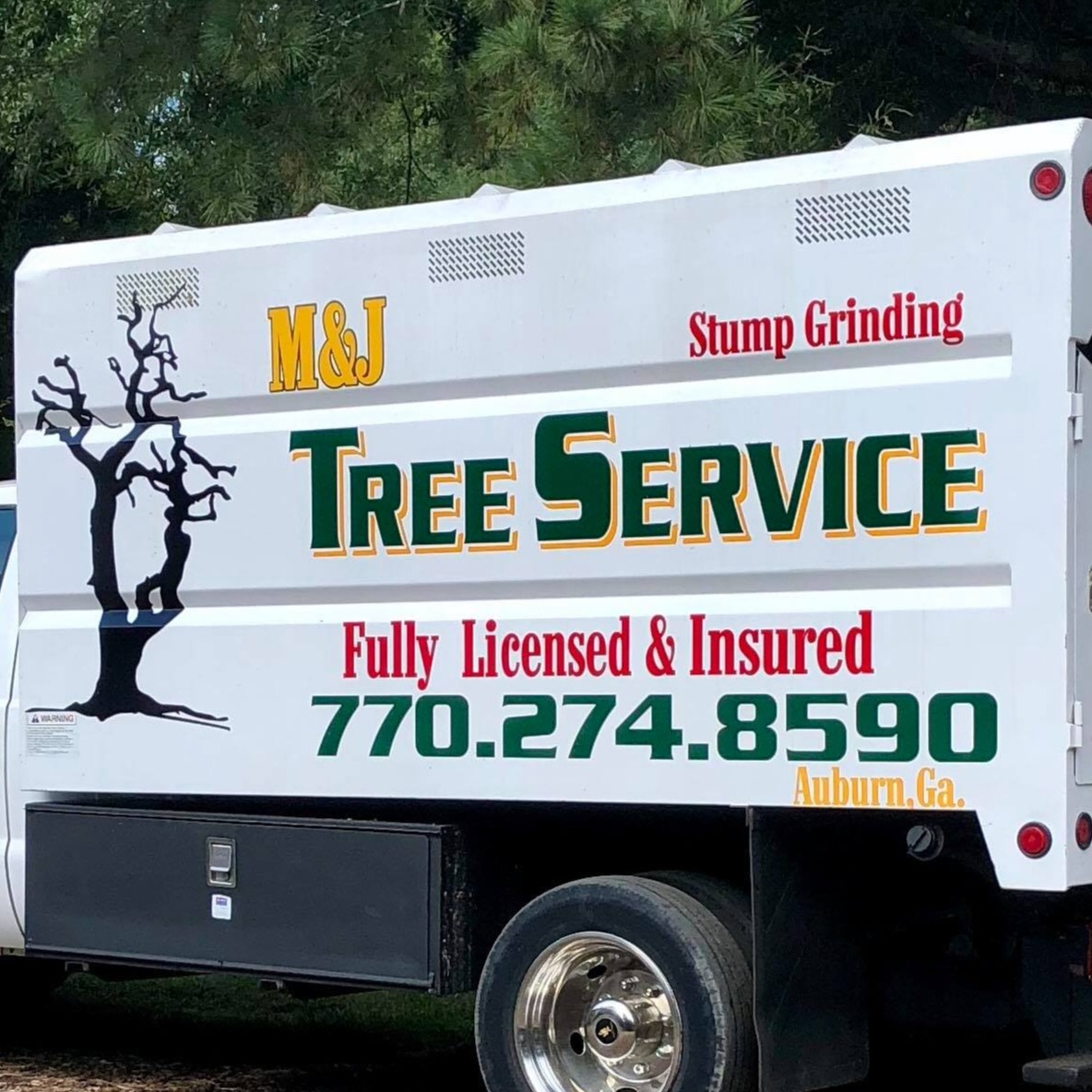 M &amp; J Tree Service and Stump Grinding Logo