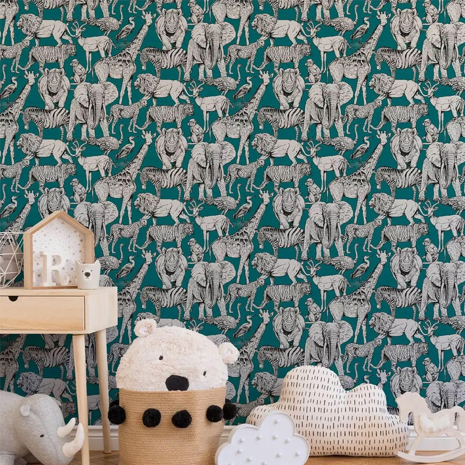 A babys room with wild animal wallpaper