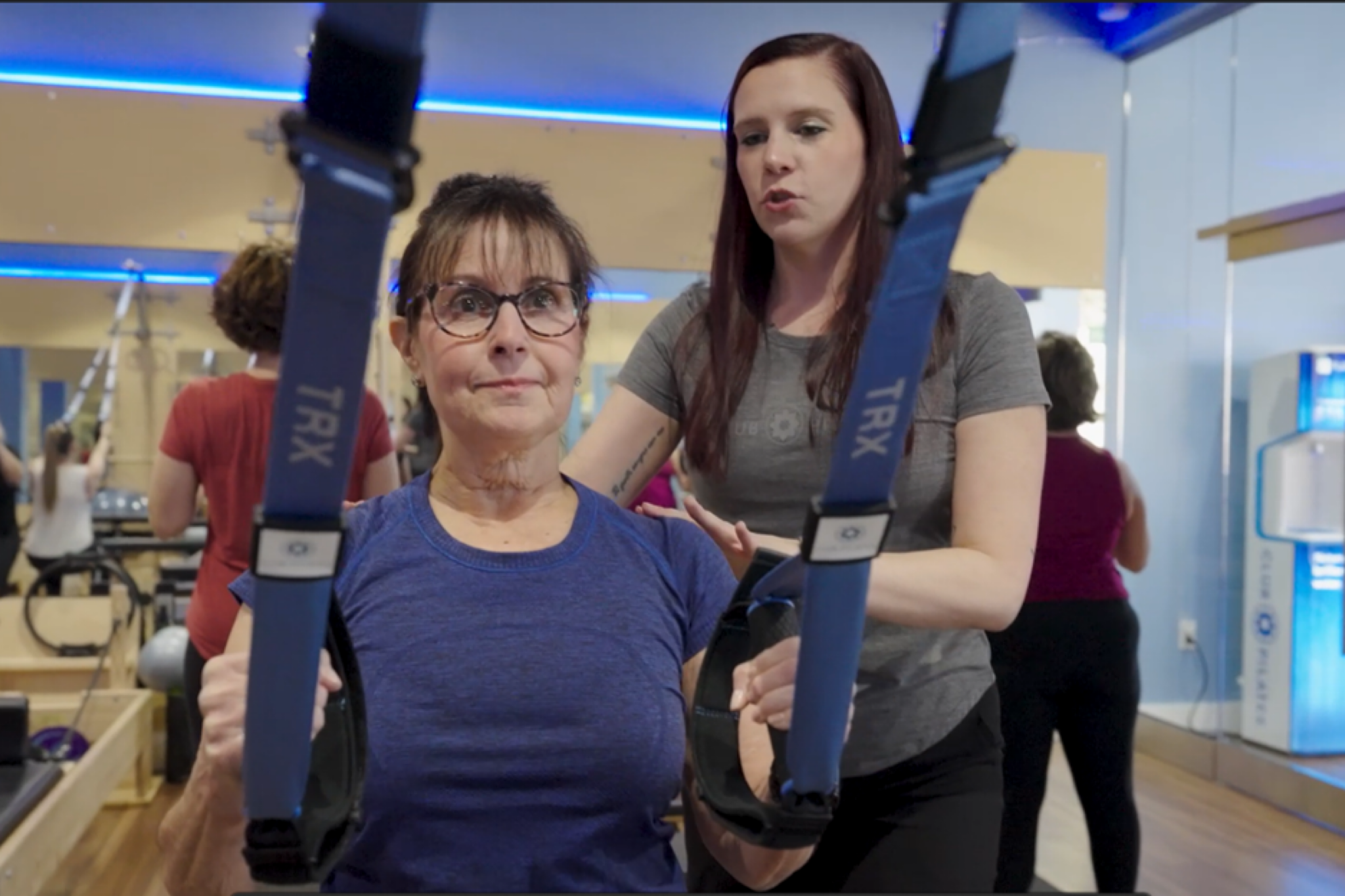 Pilates class with TRX resistance training