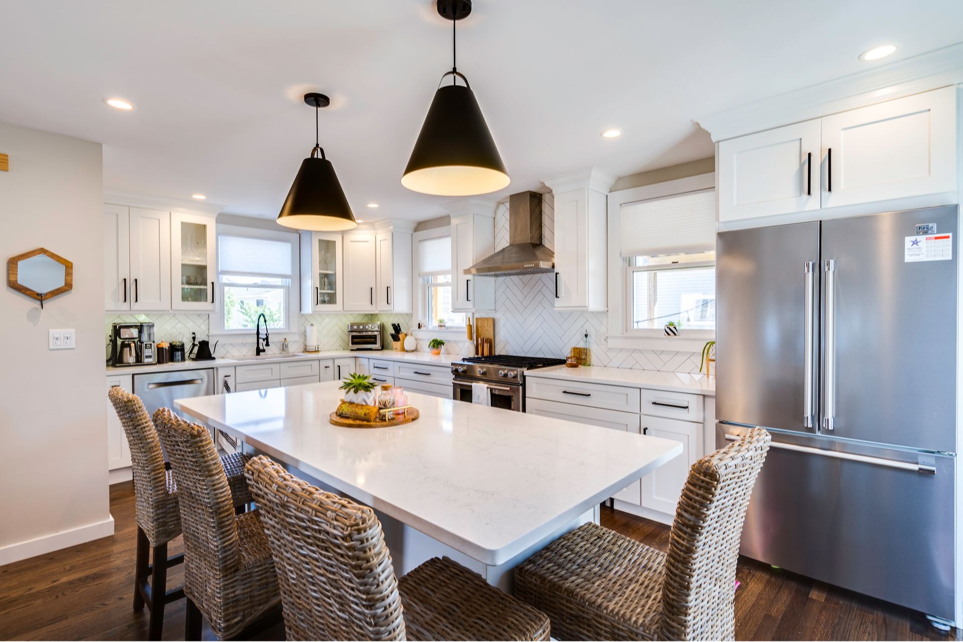Gourmet kitchen showcasing high-end details and coastal Long Island style, presented by The Vogler Team.
