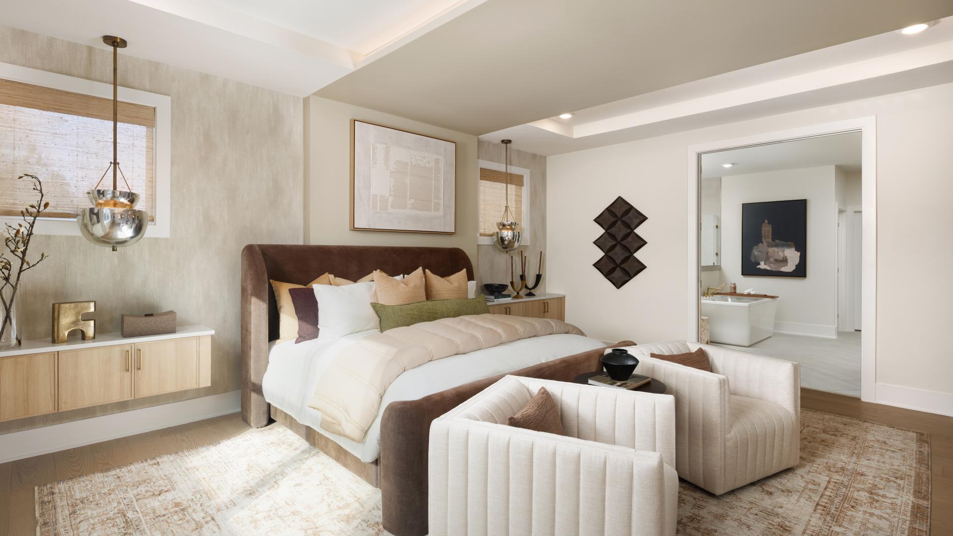 Luxurious primary bedroom suites feature dual walk-in closets