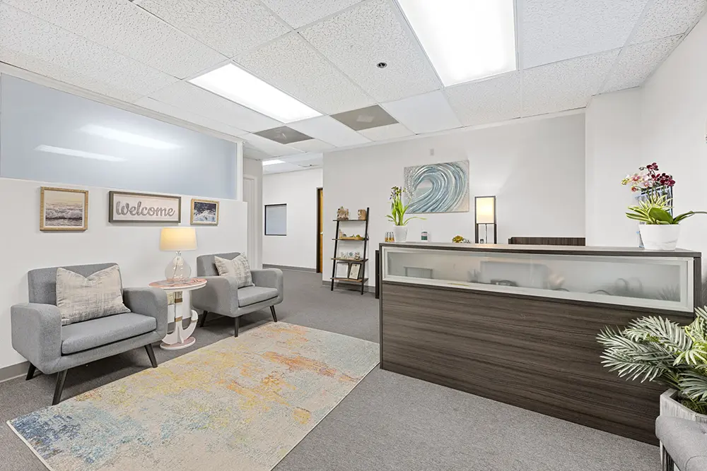 Welcoming and well-lit waiting room designed to create a comfortable, safe, and supportive atmosphere for clients and families.
