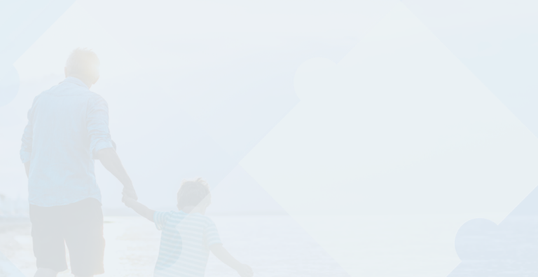 A grandfather and child walking in a lake, with a puzzle piece gradient on top.