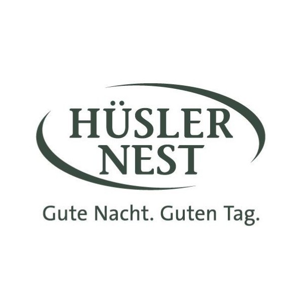 Erlacher Polster GmbH & Hüsler Nest Center Langenthal Logo