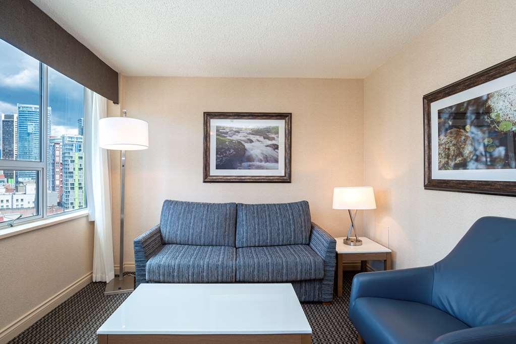 Best Western Premier Chateau Granville Hotel & Suites & Conf. Centre in Vancouver: Suite King Living Room- The separate living room area provides plenty of space to spread out and relax in style.