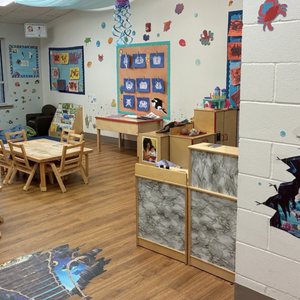 Bright and colorful preschool classroom at Childcare Network with age-appropriate learning materials