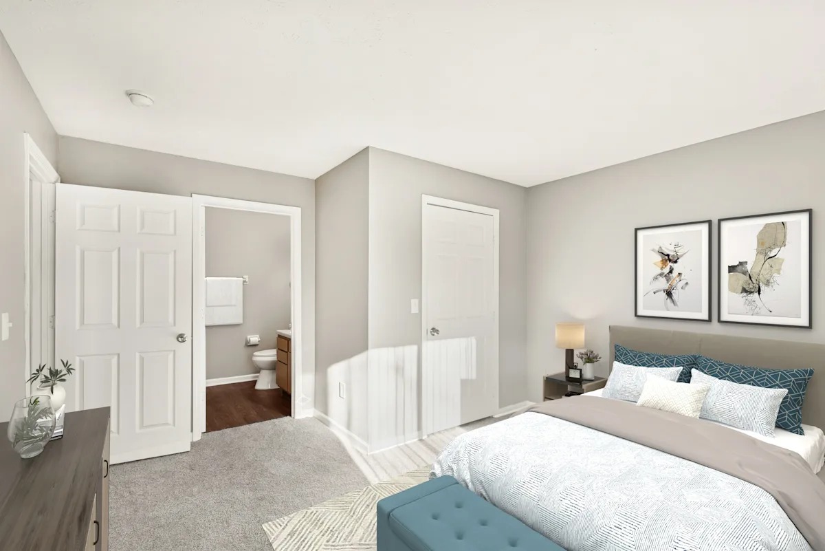 A bedroom with two doors