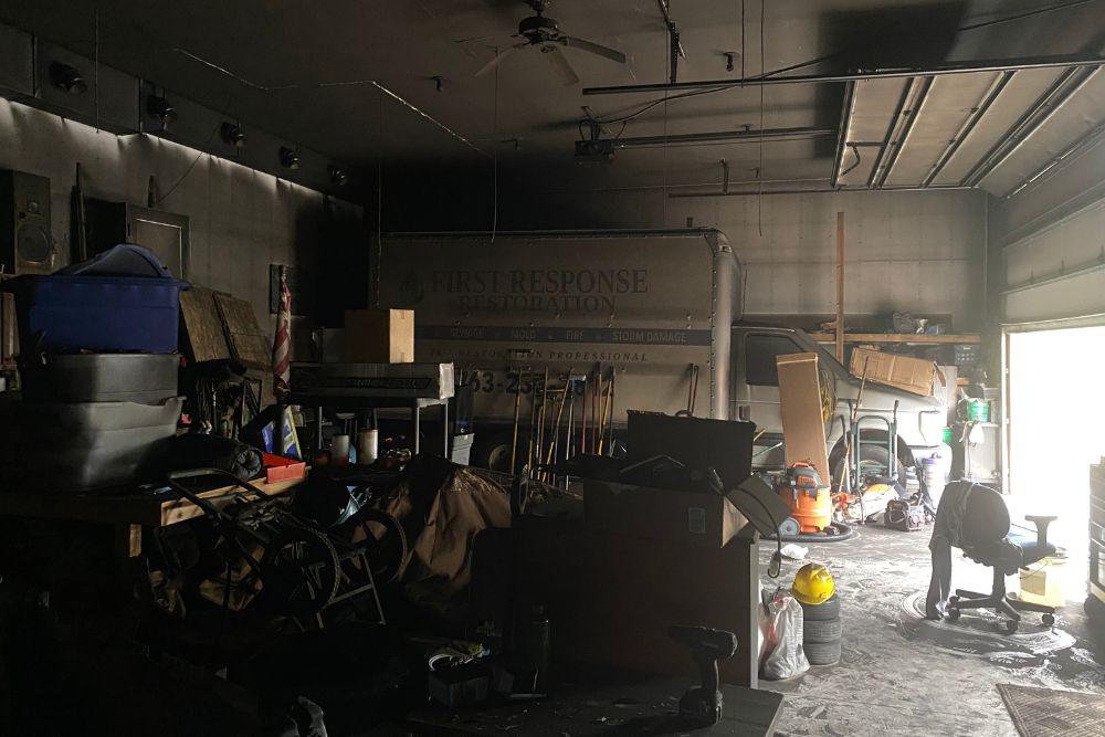 Fire damage debris removal.  Pictured here is fire-damaged and water-damaged equipment from a shop fire.