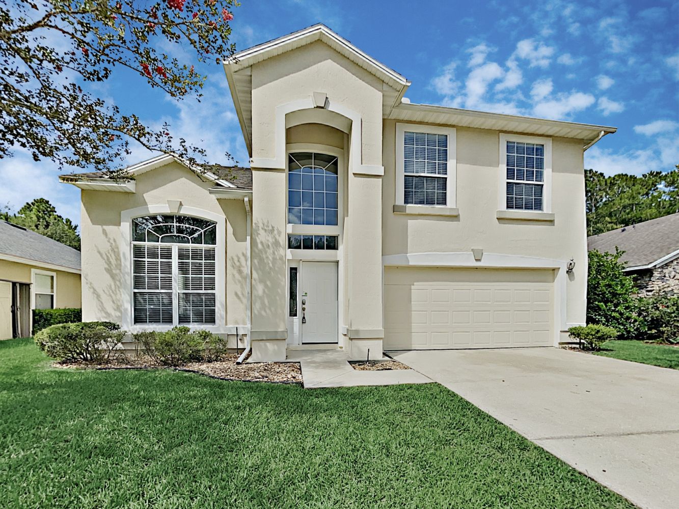 Gorgeous home with a two-car garage at Invitation Homes Jacksonville.