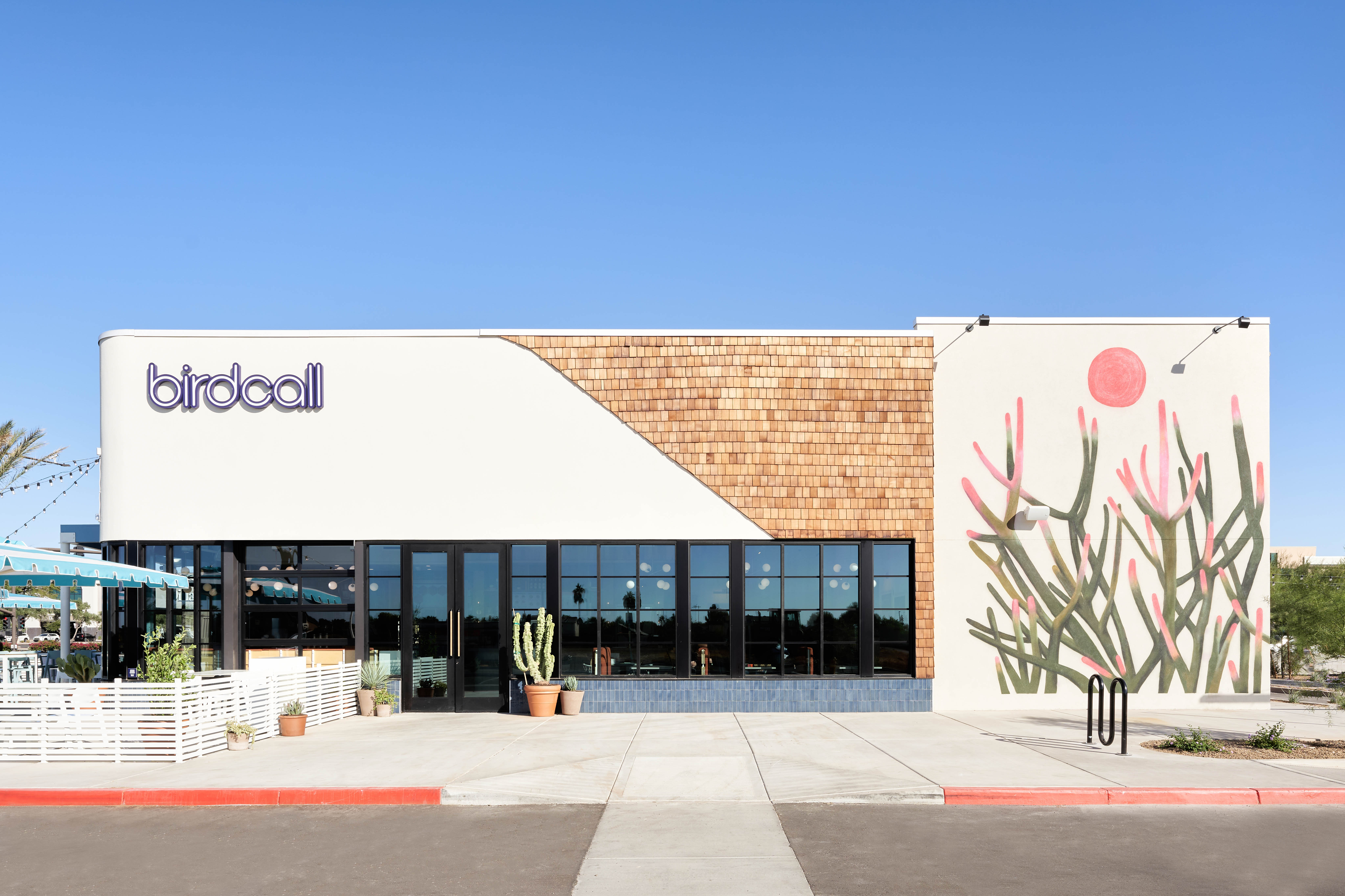Exterior of Birdcall SanTan Village featuring a unique mural.