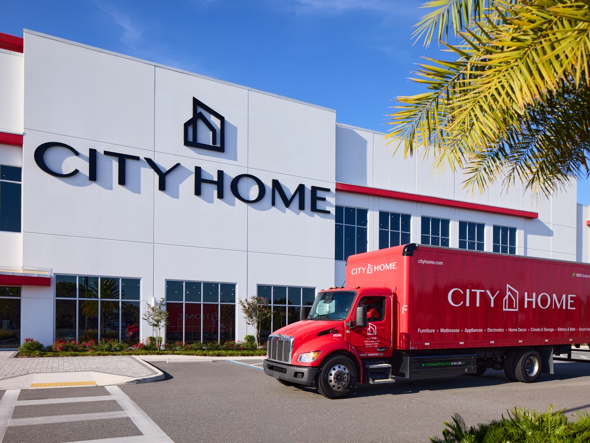 CITY HOME showroom exterior and CITY Moves truck