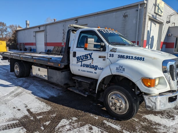 Images Busy Towing LLC