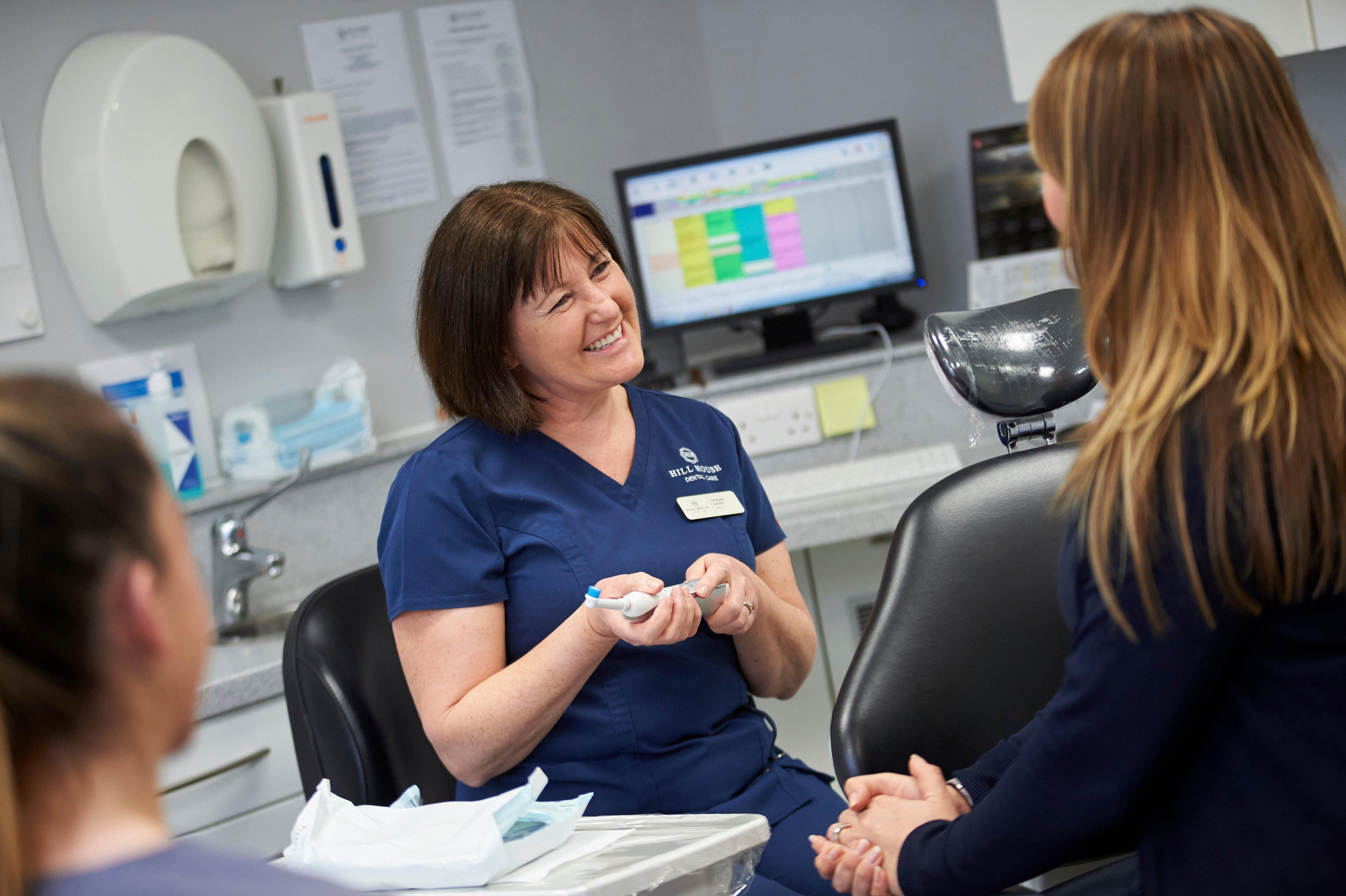 Dr Ruth Laslett speaks to a patient at Hill House Dental Care Hill House Dental Care Tunbridge Wells 01892 525798