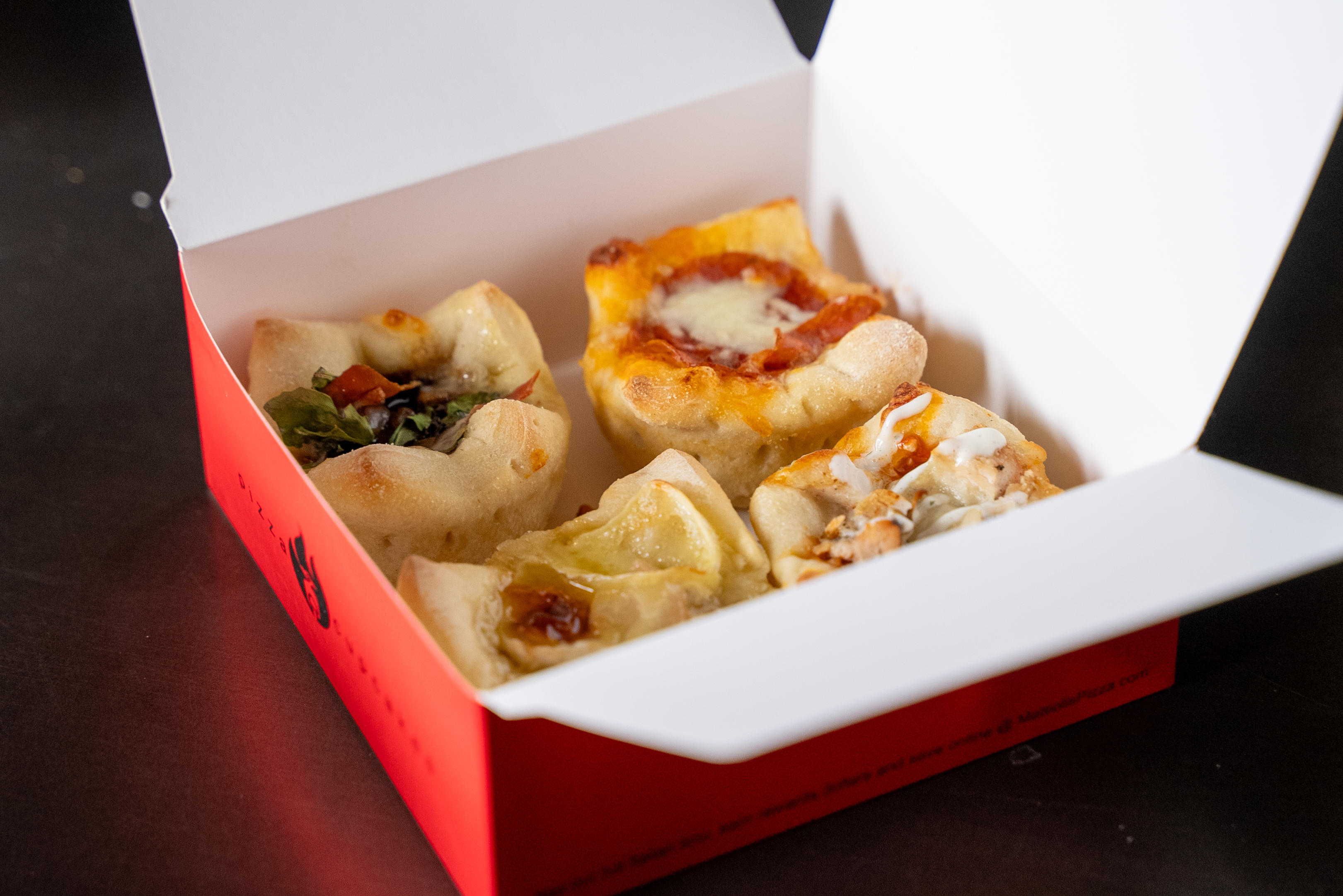 Our own unique creation. Try several of our pizzas in handheld cupcake versions. Mix and match.