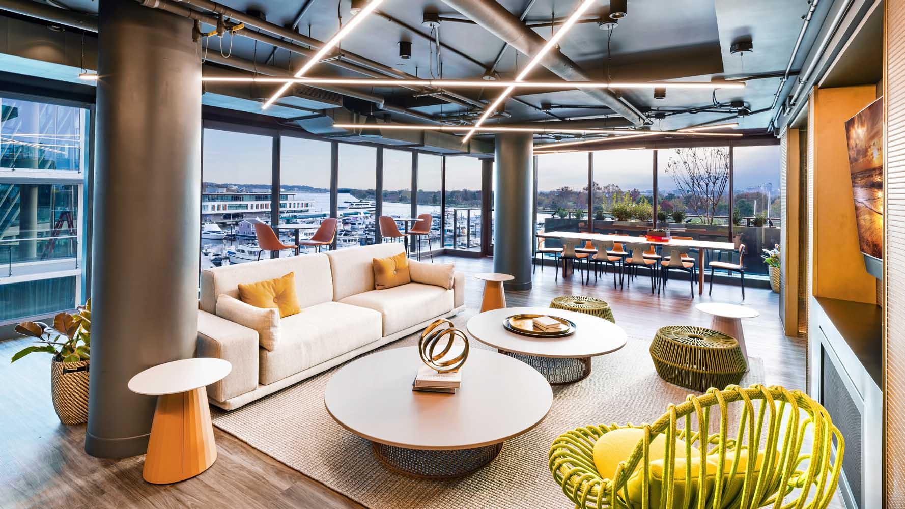 Relax and enjoy panoramic views of The Wharf's waterfront from The Living Room